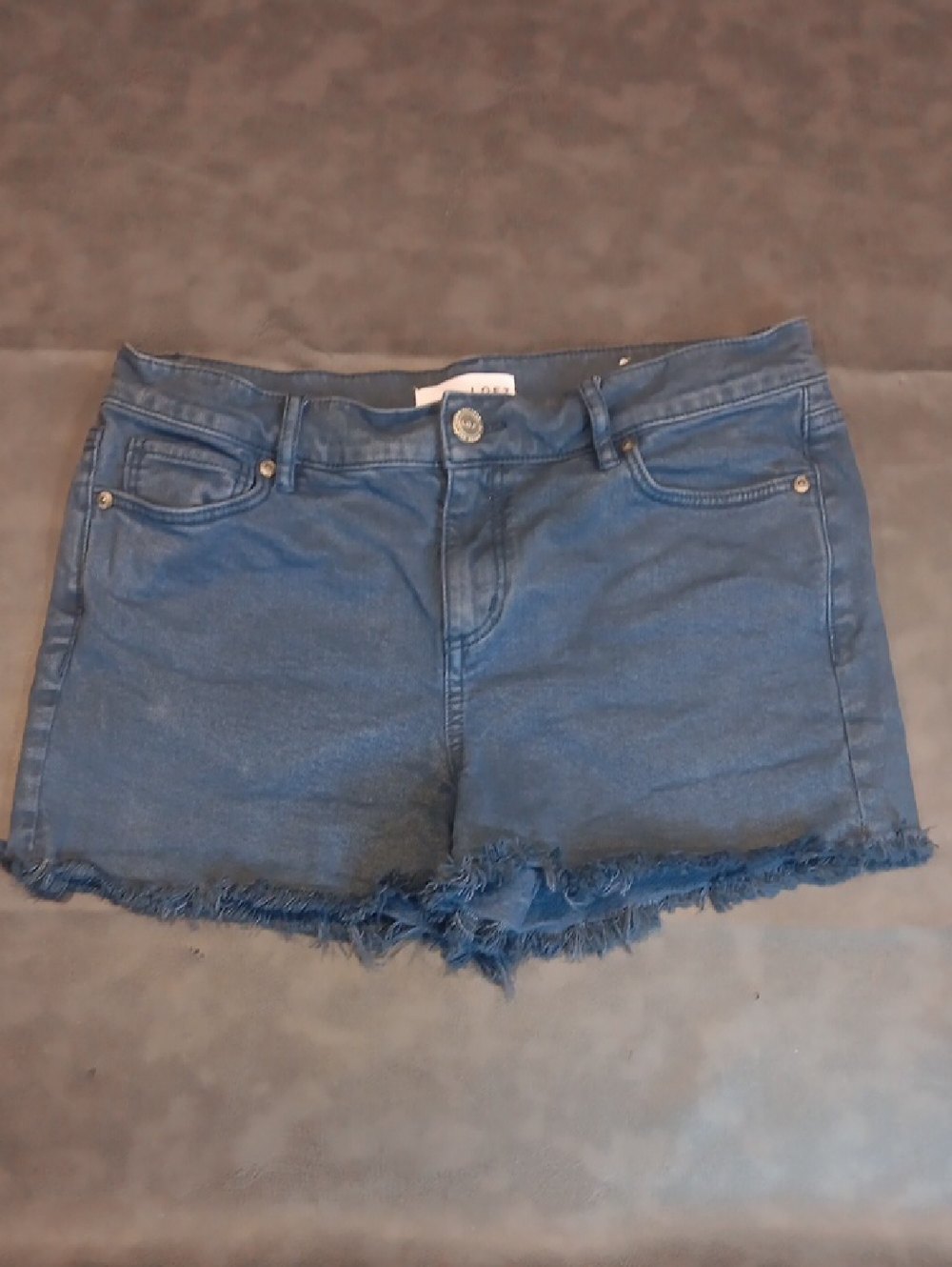 LOFT Distressed Denim Cutoff Shorts in Blue